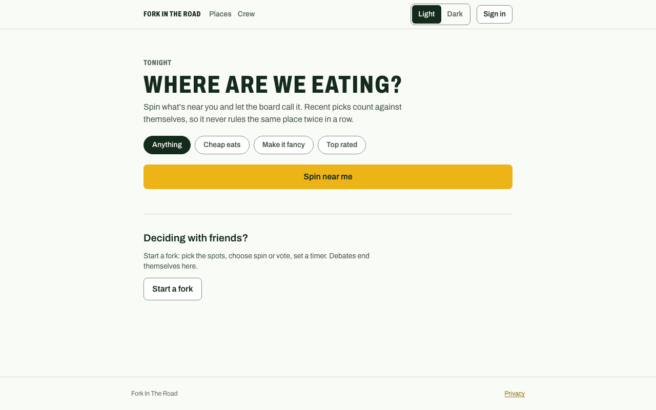 The Fork In The Road home screen: a 'Tonight' label above the headline 'Where are we eating?', four mood filters, a gold 'Spin near me' button, and a 'Start a fork' action for deciding with friends.